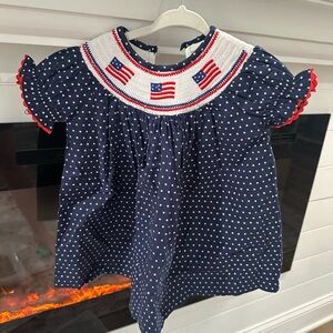 Navy Polka Dot Dress with Flag Detail